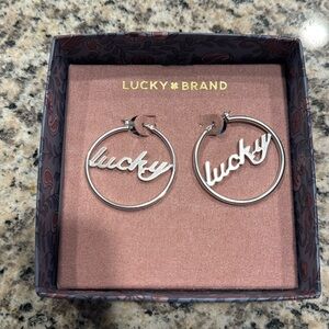 Lucky Brand Silver Hoop Earrings Lucky in Cursive Script NWT